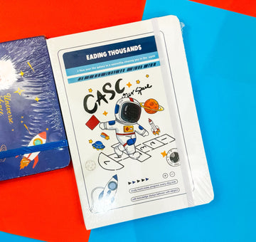 Product packaging with astronaut illustration on a colorful background