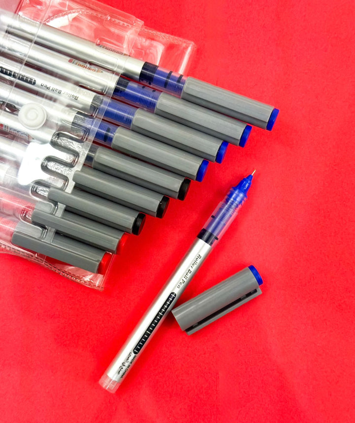 Set of pens with blue ink on a red background