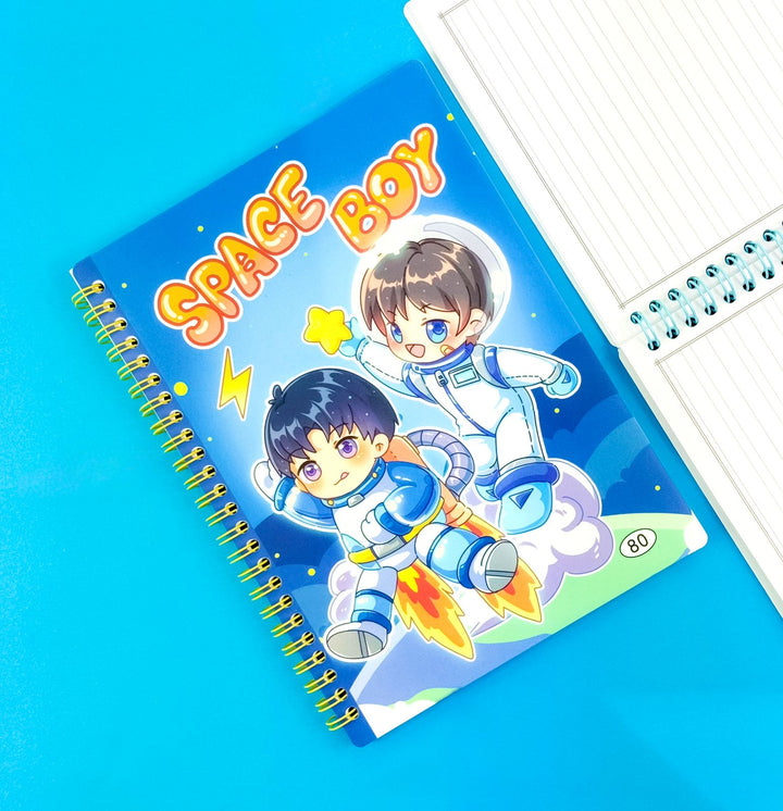 Notebook with 'Space Boy' design on a blue background